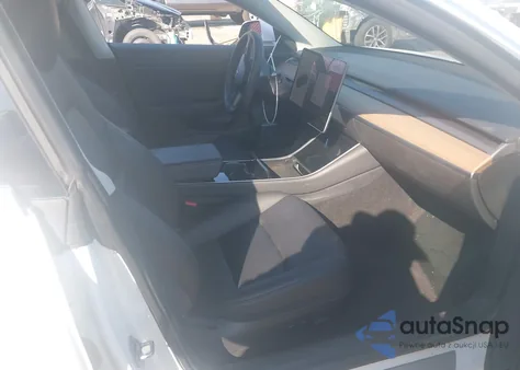 2020 Tesla Model 3 из США, поврежденный, VIN 5YJ3E1EA8LF709013